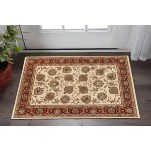 Photo of Ivory And Red Oriental Area Rug