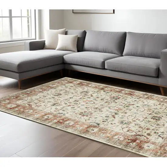 Ivory And Rust Oriental Distressed Area Rug Photo 1