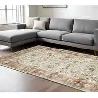 Photo of Ivory And Rust Oriental Distressed Area Rug