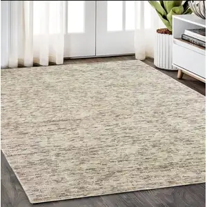 Photo of Ivory And Sand Hand Tufted Area Rug