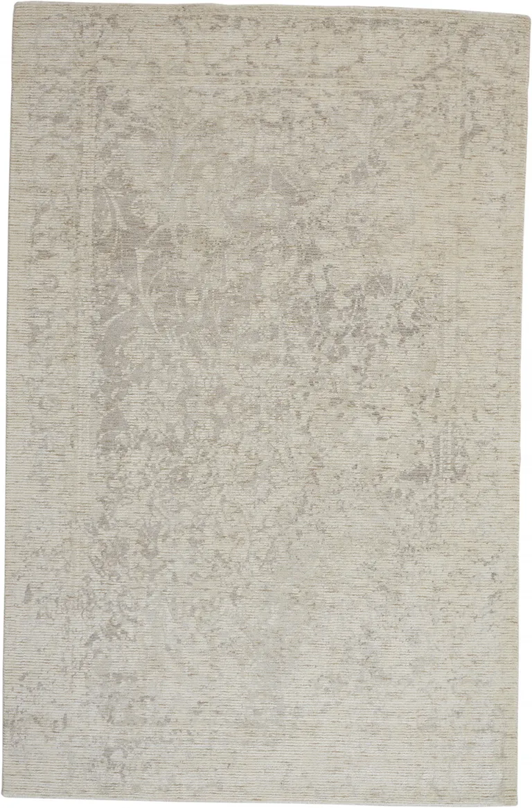 Ivory And Tan Abstract Hand Woven Area Rug Photo 1