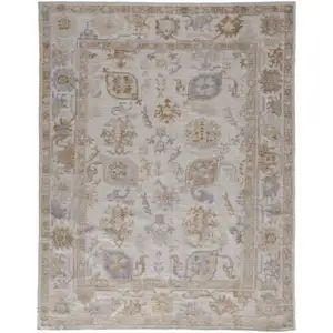 Photo of Ivory And Tan Floral Hand Knotted Stain Resistant Area Rug