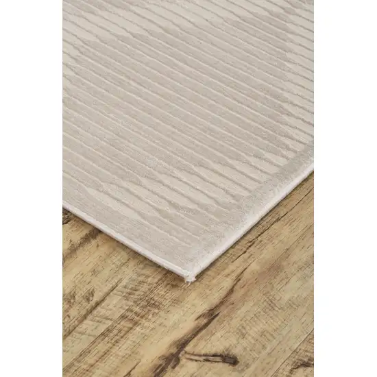Ivory And Tan Geometric Stain Resistant Area Rug Photo 4