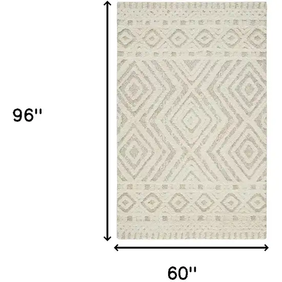 Ivory And Tan Wool Geometric Tufted Handmade Stain Resistant Area Rug Photo 3