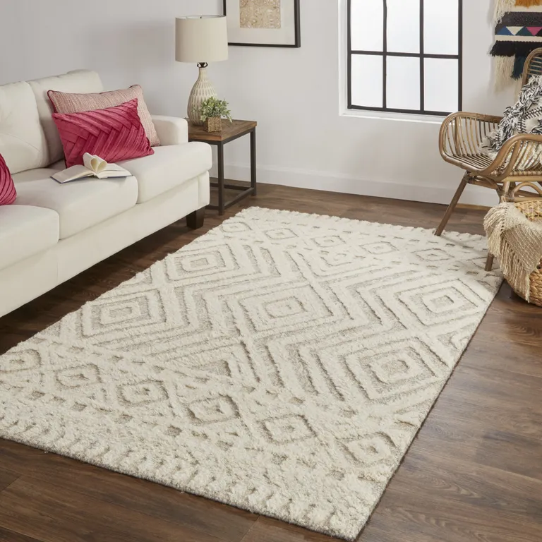 Ivory And Tan Wool Geometric Tufted Handmade Stain Resistant Area Rug Photo 1