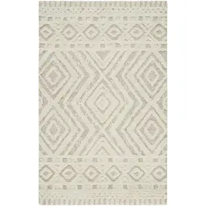 Photo of Ivory And Tan Wool Geometric Tufted Handmade Stain Resistant Area Rug