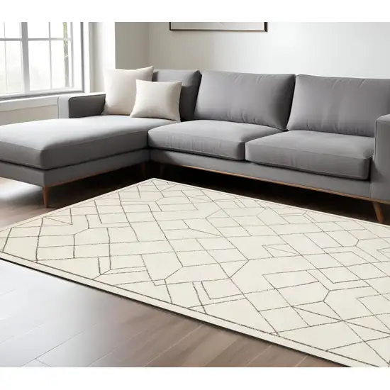 Ivory And Taupe Geometric Area Rug Photo 1