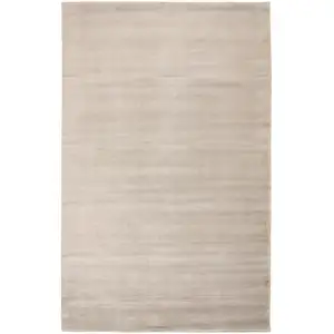 Photo of Ivory And Taupe Hand Woven Distressed Area Rug