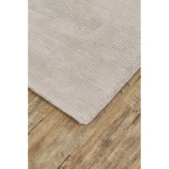 Ivory And Taupe Hand Woven Distressed Area Rug Photo 3