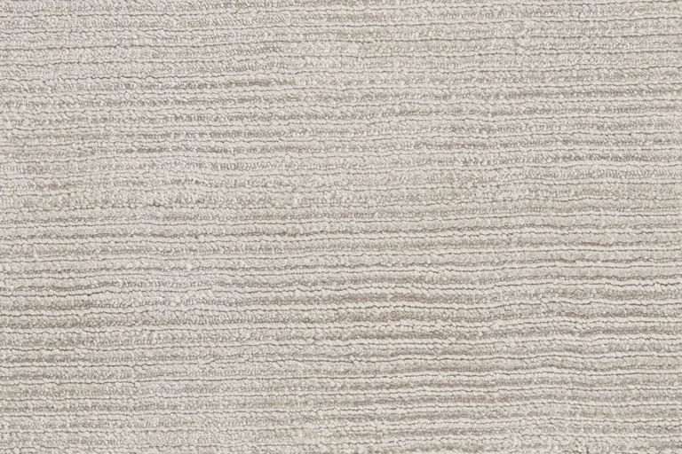 Ivory And Taupe Hand Woven Distressed Area Rug Photo 5