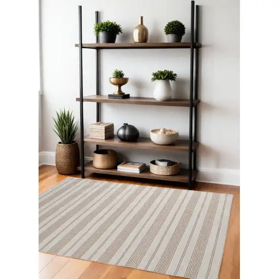 Ivory And Taupe Striped Dhurrie Hand Woven Stain Resistant Area Rug Photo 1