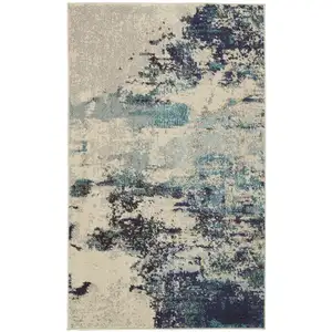 Photo of Ivory And Teal Blue Abstract Power Loom Non Skid Area Rug