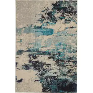 Photo of Ivory And Teal Blue Abstract Power Loom Non Skid Area Rug