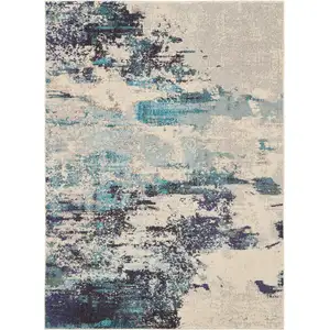 Photo of Ivory And Teal Blue Abstract Power Loom Non Skid Area Rug