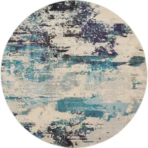 Photo of Ivory And Teal Blue Round Abstract Power Loom Non Skid Area Rug