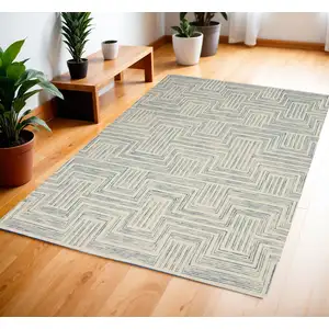 Photo of Ivory And Turquoise Wool Geometric Area Rug