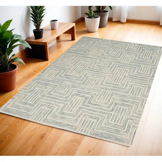 Ivory And Turquoise Wool Geometric Area Rug Photo 1