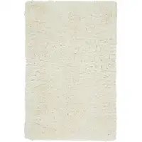 Photo of Ivory And White Shag Tufted Handmade Stain Resistant Area Rug