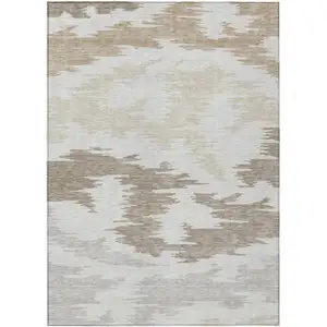 Photo of Ivory Beige And Brown Abstract Washable Indoor Outdoor Area Rug