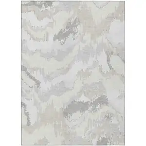 Photo of Ivory Beige And Cream Abstract Washable Indoor Outdoor Area Rug