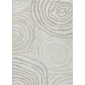 Photo of Ivory Beige And Khaki Abstract Washable Indoor Outdoor Area Rug