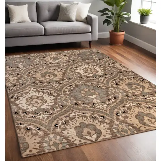 Ivory Beige And Light Blue Floral Stain Resistant Area Rug Photo 1