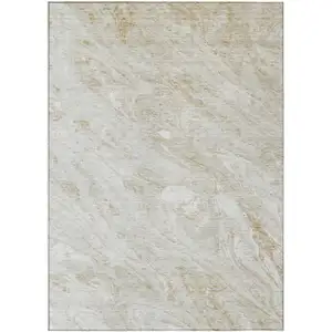 Photo of Ivory Beige And Tan Abstract Washable Indoor Outdoor Area Rug