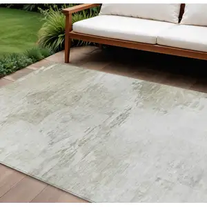 Photo of Ivory Beige And Taupe Abstract Washable Indoor Outdoor Area Rug