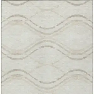 Photo of Ivory Beige And Taupe Abstract Washable Indoor Outdoor Area Rug