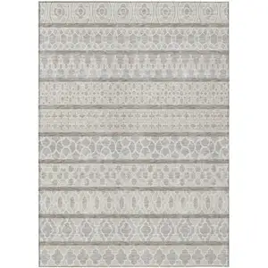 Photo of Ivory Beige And Taupe Quatrefoil Washable Indoor Outdoor Area Rug