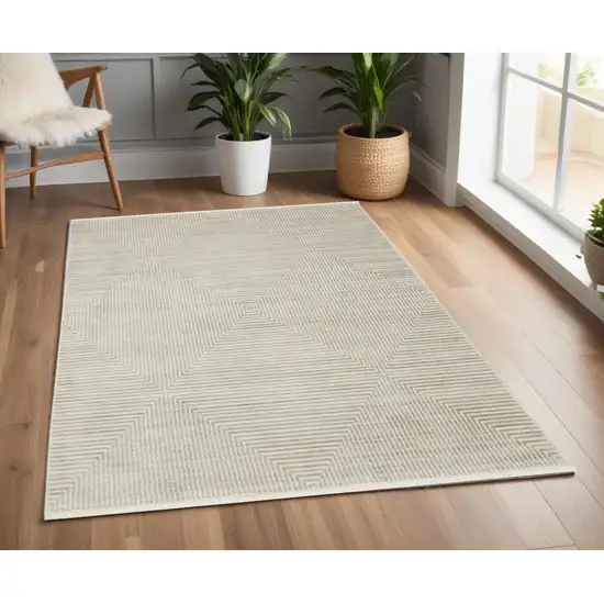 Ivory Beige Taupe And Tan Geometric Power Loom Stain Resistant Area Rug With Fringe Photo 1