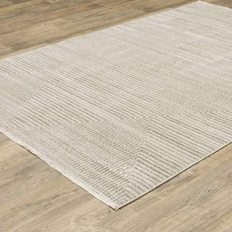 Ivory Beige Taupe And Tan Geometric Power Loom Stain Resistant Area Rug With Fringe Photo 4