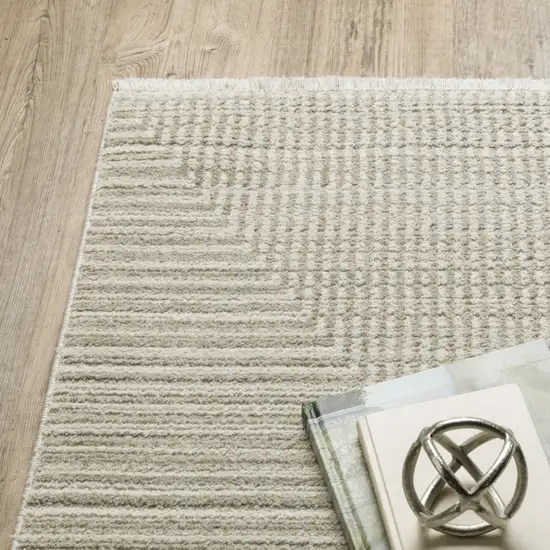 Ivory Beige Taupe And Tan Geometric Power Loom Stain Resistant Area Rug With Fringe Photo 5