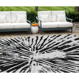 Photo of Ivory Black And Gray Abstract Washable Indoor Outdoor Area Rug