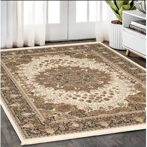 Photo of Ivory Black And Tan Medallion Area Rug With Fringe