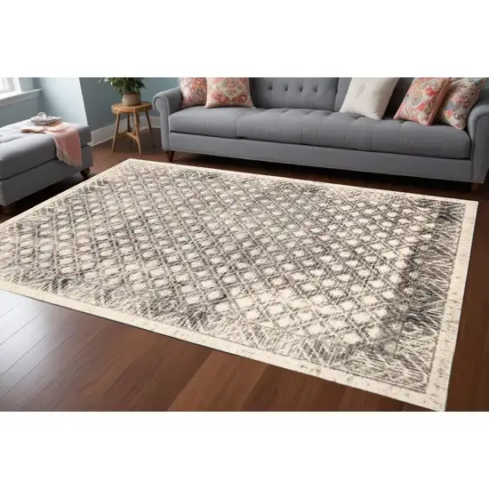 Ivory Black And Taupe Abstract Stain Resistant Area Rug Photo 1