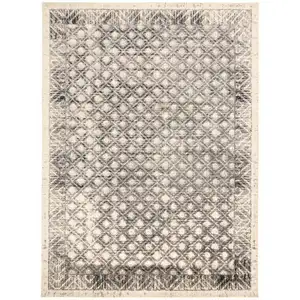 Photo of Ivory Black And Taupe Abstract Stain Resistant Area Rug