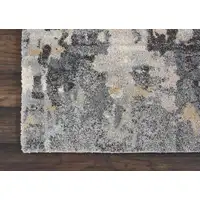 Photo of Ivory Black and Gray Abstract Distressed Area Rug