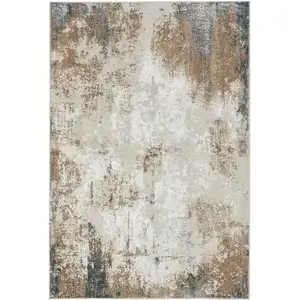 Photo of Ivory Black and Taupe Abstract Distressed Non Skid Area Rug