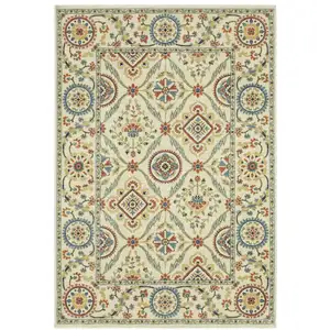 Photo of Ivory Blue And Burnt Orange Oriental Area Rug With Fringe