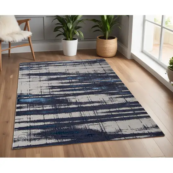 Ivory and Blue Abstract Power Loom Distressed Non Skid Area Rug Photo 1