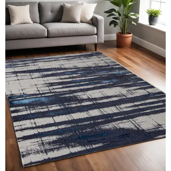 Ivory and Blue Abstract Power Loom Distressed Non Skid Area Rug Photo 1