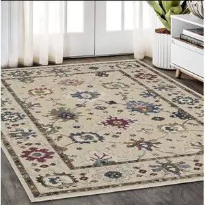 Photo of Ivory Blue And Gray Floral Area Rug With Fringe