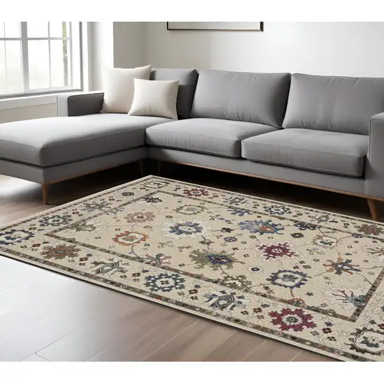 Ivory Blue And Light Brown Floral Area Rug With Fringe Photo 1