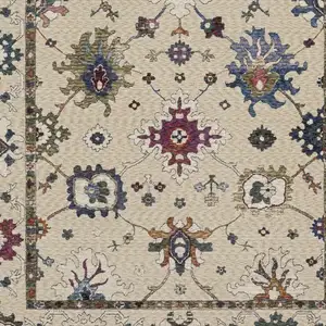 Photo of Ivory Blue And Light Brown Floral Area Rug With Fringe