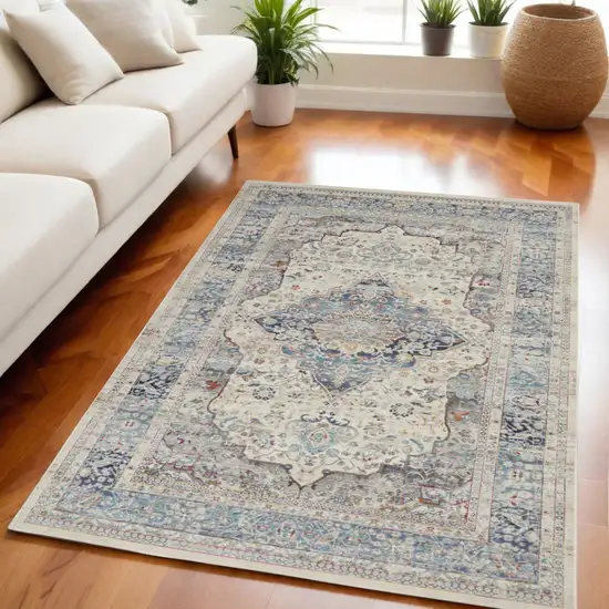 Ivory Blue And Orange Floral Distressed Area Rug Photo 1