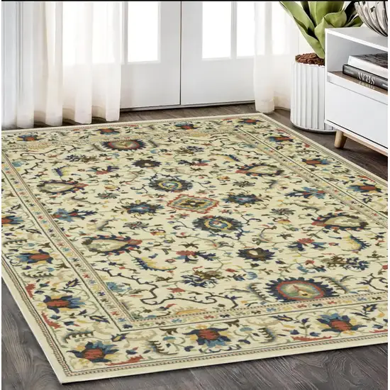 Ivory Blue And Orange Oriental Area Rug With Fringe Photo 1