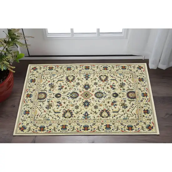 Ivory Blue And Orange Oriental Area Rug With Fringe Photo 1