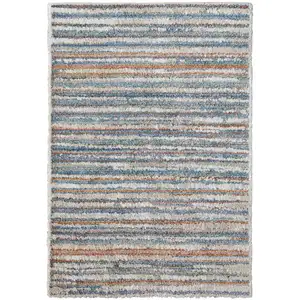 Photo of Ivory Blue And Orange Striped Power Loom Stain Resistant Area Rug