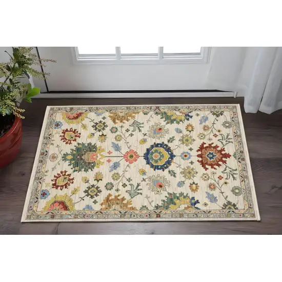 Ivory Blue And Red Oriental Area Rug With Fringe Photo 1